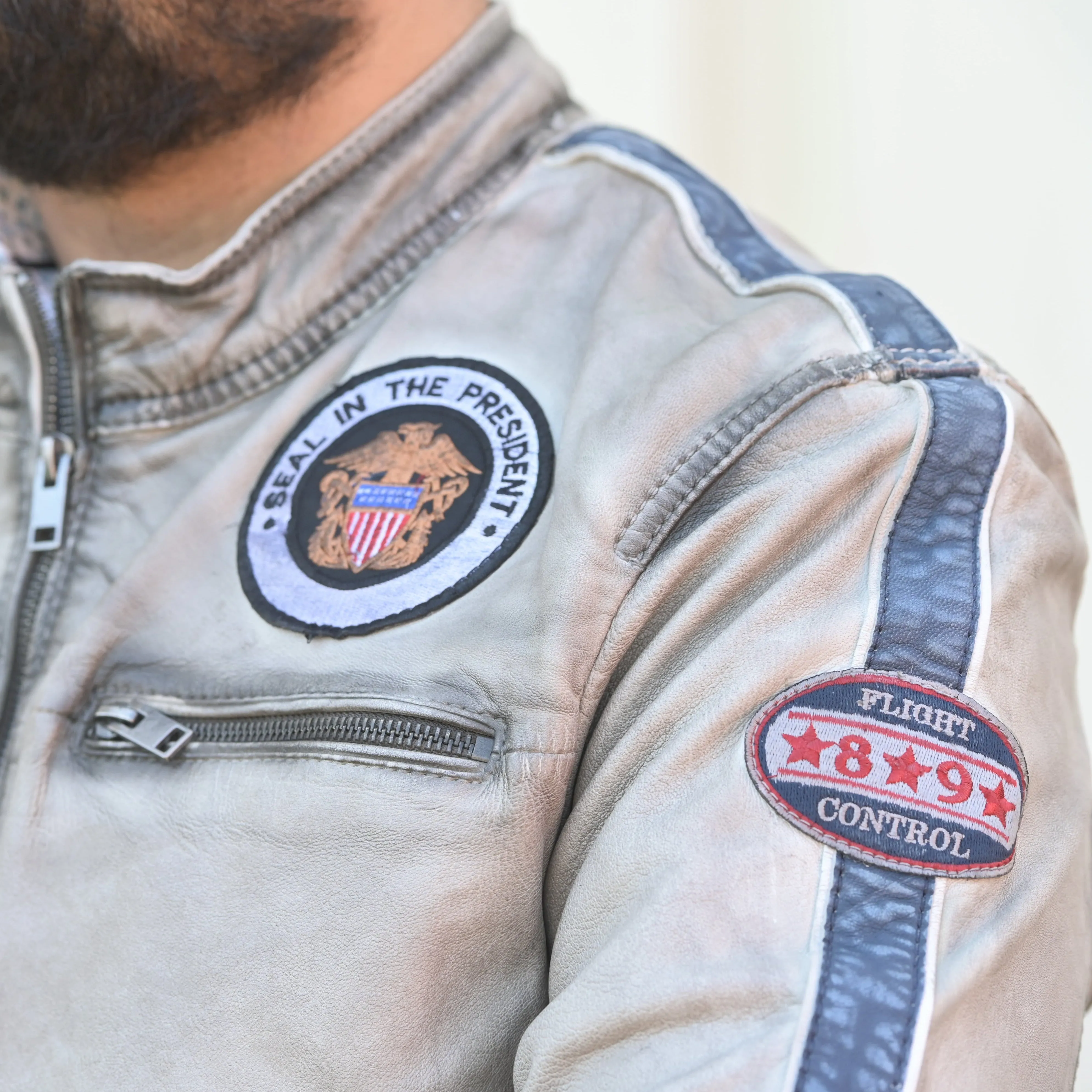 Men's Leather Jacket with Patches and Four Zip Pockets